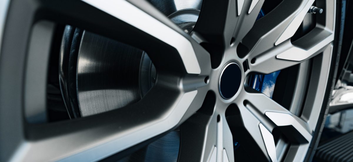 Aluminium rim of luxury car wheel close up photo